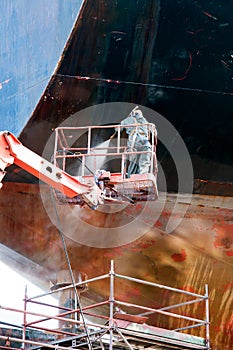 Cleaning the ship's side