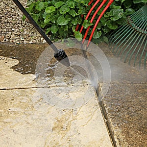 Cleaning the slabs of an outdoor terrace of a house with a karcher