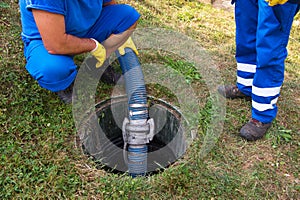 Cleaning sludge from septic system