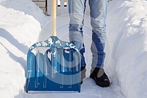 Cleaning snow after a snowstorm in the morning