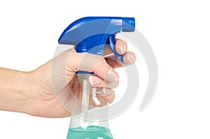 Cleaning spray bottle in hand isolated on white background. Housework and sanitary concept