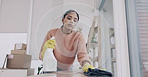 Cleaning, spray and chemical with woman in living room for hygiene, housekeeping and bacteria. Furniture, sanitary and