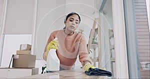 Cleaning, spray and furniture with woman in living room for hygiene, housekeeping and bacteria. Chemicals, sanitary and