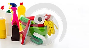 Cleaning supplies and bowls isolated against white background
