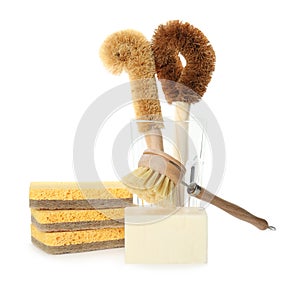 Cleaning supplies for dish washing on white background