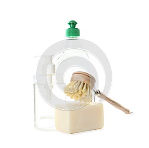 Cleaning supplies for dish washing on white background