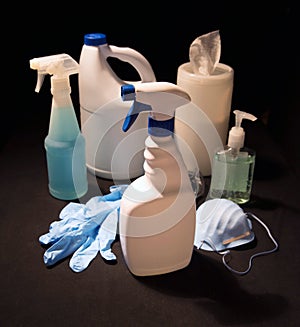 Cleaning supplies and equipment for sanitizing on black photo