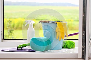 Cleaning supplies on the windowsill