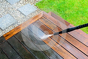 Cleaning terrace with a power washer