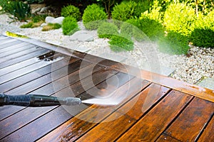 Cleaning terrace with a power washer