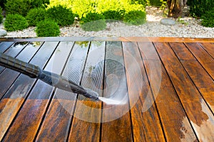 Cleaning terrace with a power washer