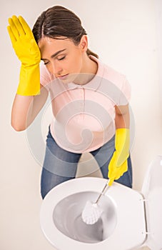 Cleaning the toilet