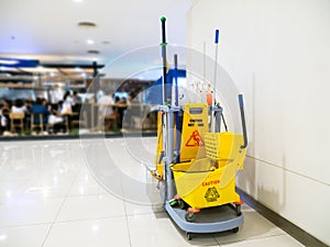 Cleaning tools cart wait for cleaning.Bucket and set of cleaning equipment in the Department store.