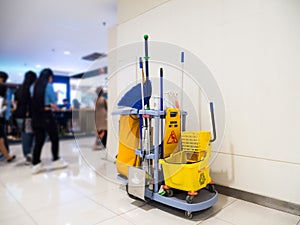 Cleaning tools cart wait for cleaning.Bucket and set of cleaning equipment in the Department store