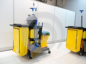 Cleaning tools cart wait for cleaning.Bucket and set of cleaning equipment in the office. janitor service janitorial