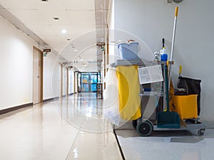 Cleaning tools cart wait for maid or cleaner in the hospital. Bucket and set of cleaning equipment in the hospital. Concept photo