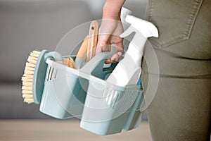 Cleaning tools, clean service and brush with hands holding basket with sponge and hygiene products. Mockup for