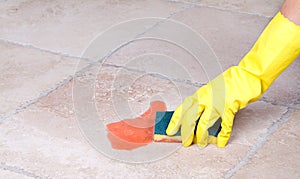 Cleaning up spill with sponge