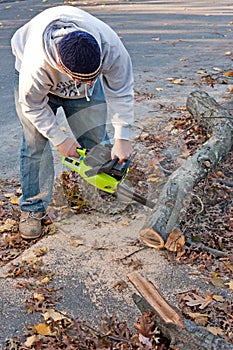 Cleaning Up Storm Damage with a Chainsaw