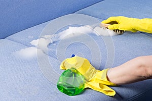 Cleaning upholstered furniture upholstery with chemicals