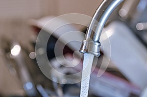 Cleaning water flowing from pipe tap