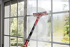 Cleaning window with steam