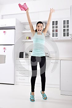 Cleaning woman happy jumping