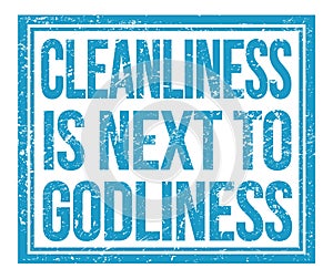 CLEANLINESS IS NEXT TO GODLINESS, text on blue grungy stamp sign photo
