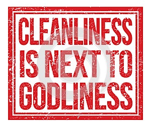 CLEANLINESS IS NEXT TO GODLINESS, text on red grungy stamp sign photo