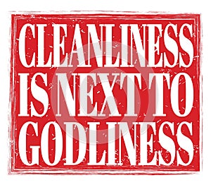 CLEANLINESS IS NEXT TO GODLINESS, text on red stamp sign photo