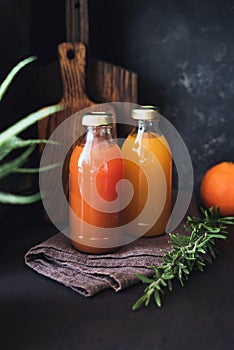 Cleansing fresh citrus juices in bottles