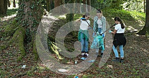 Cleanup volunteers cleaning up the forest