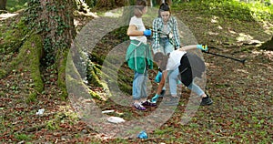 Cleanup volunteers cleaning up the forest