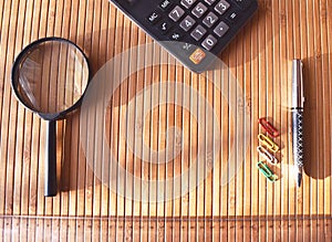 Clear Bamboo desk with some office material