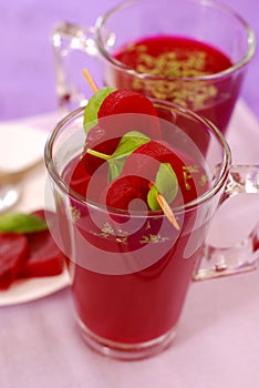 Clear beet soup in glass