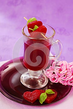 Clear beet soup in glass