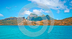 Clear blue lagoon with a view on the tropical island of Bora Bora, near Tahiti, in French Polynesia