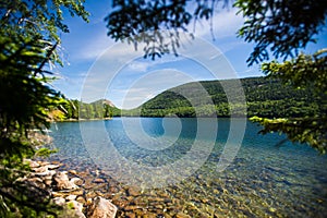 Clear blue rocky bottom lake and hidden gem in Bar Harbor photo