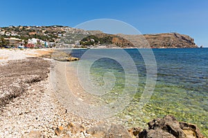 Clear blue sea Xabia Spain at Platja de la Grava beach located south-east of Denia also known as Javea photo