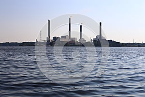 Clear blue skies by an industrial power plant at Springfield Illinois Lake