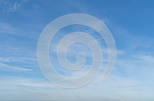 Clear blue sky with white fluffy clouds at noon. Day time. Abstract nature landscape background