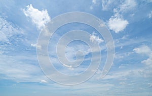 Clear blue sky with white fluffy clouds at noon. Day time. Abstract nature landscape background