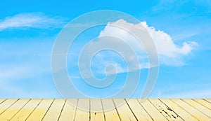 clear blue sky and wood floor, background.