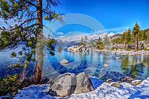 Winter beach scene at Sand Harbor Nevada State Park. Lake Tahoe, Nevada side. HDR image.