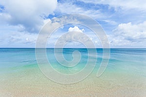 Clear blue water, tropical beach and horizon