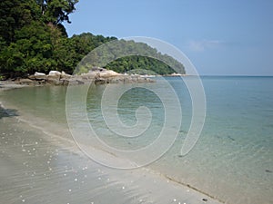 Clear blue water of a tropical beach. Pangkor island, Malaysia.