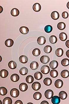 Clear and colored beads on frosted glass