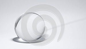 Clear Crystal Sphere Casting a Long Shadow