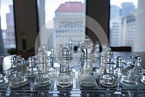 Clear glass chess and business concept