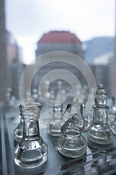 Clear glass chess and business concept